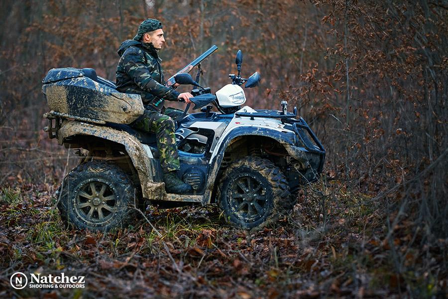 Young hunter on a quad bike in the forest?