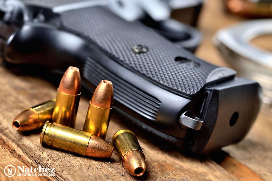 9mm handgun with ammunition feature