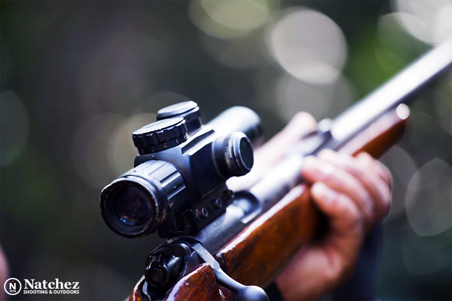 Rifle scope mounted on hunting rifle