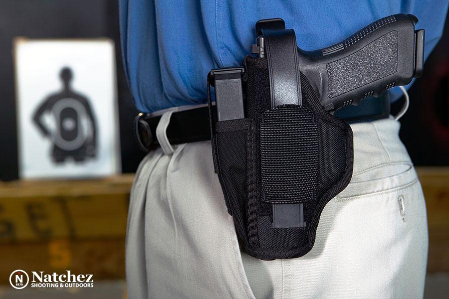 A man with an outside the waistband holster?