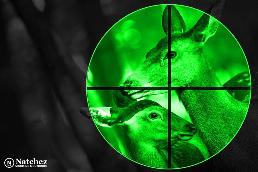 Hunter using thermal imaging to track game